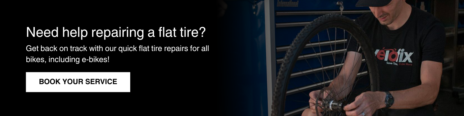 velofix bike technician fixing a bike tire flat
